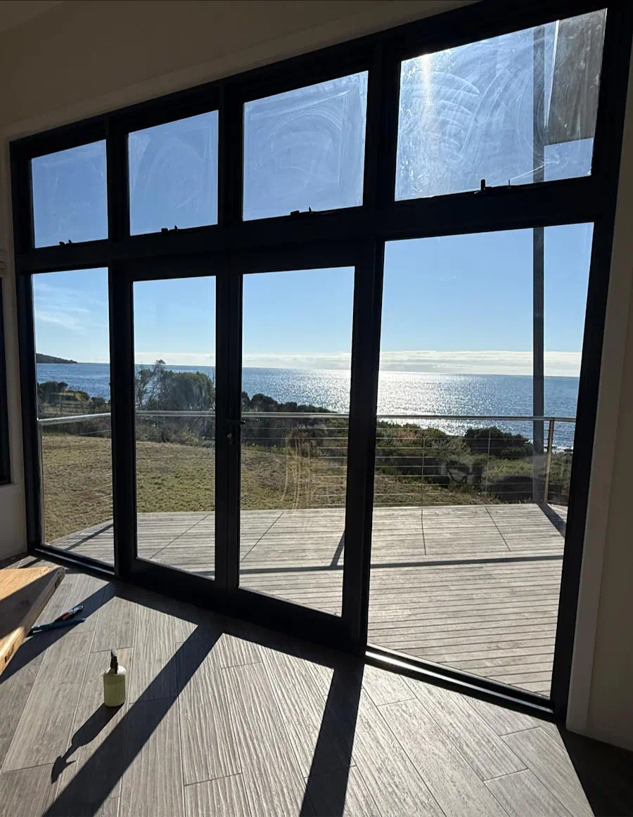 Ocean view through large glass doors