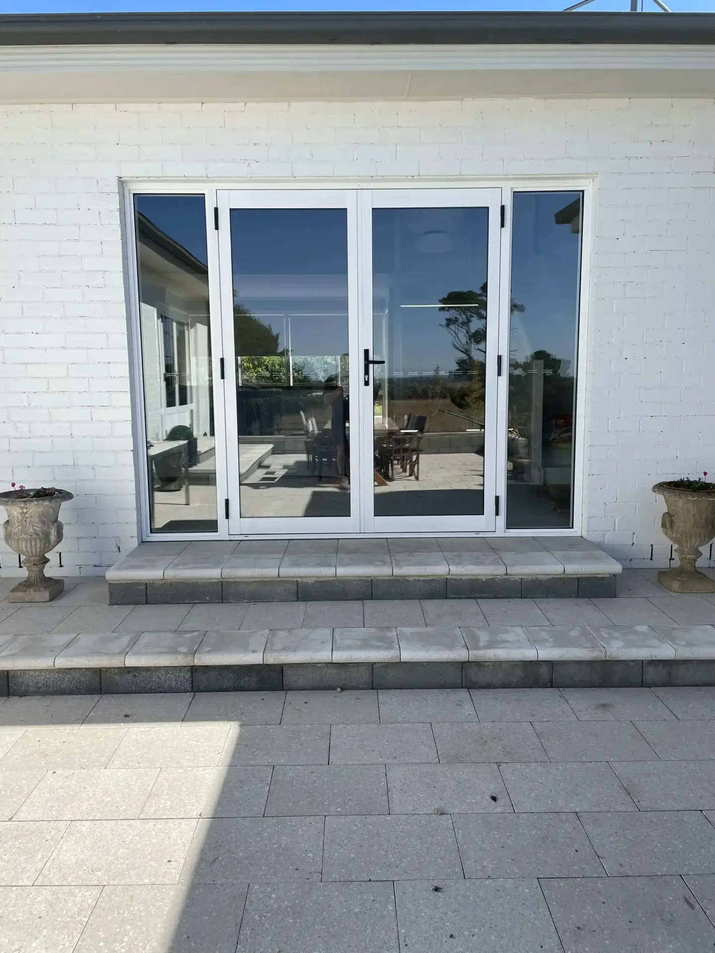 White framed sliding glass door